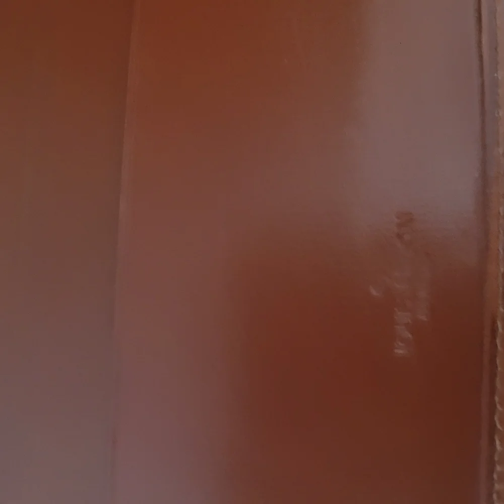 Louis Vuitton Brown Wallet with Elegant Embossed Texture